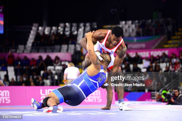 Reineris Salas of Cuba and Ronald Valverde of Peru compete during Wrestling Men's Freestyle 97kg on Day 15 of Lima 2019 Pan American Games at Miguel...