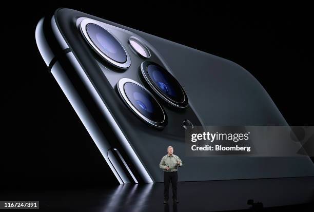 Phil Schiller, senior vice president of worldwide marketing at Apple Inc., speaks about the new iPhone Pro during an event at the Steve Jobs Theater...