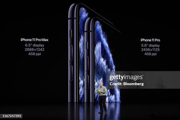 Phil Schiller, senior vice president of worldwide marketing at Apple Inc., speaks about the new iPhone Pro during an event at the Steve Jobs Theater...