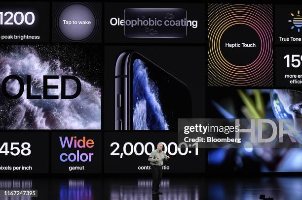 Phil Schiller, senior vice president of worldwide marketing at Apple Inc., speaks about the new iPhone Pro during an event at the Steve Jobs Theater...