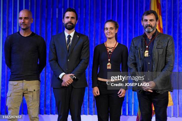 Carola Rackete , German ship captain who works for the German sea rescue organisation Sea-Watch, and Spaniard Oscar Camps , founder Proactiva Open...