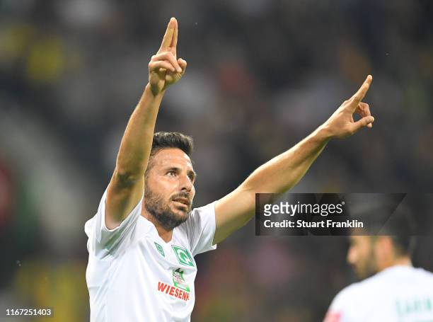 Claudio Pizarro of Bremen celebrates scoring the sixth goal during the DFB Cup first round match between Atlas Delmenhorst and SV Werder Bremen at...