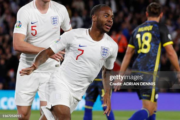 England's midfielder Raheem Sterling celebrates after scoring the equalising goal during the UEFA Euro 2020 qualifying Group A football match between...