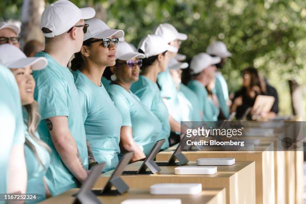 Employees stand at check-in kiosks ahead of an Apple Inc. Event at the Steve Jobs Theater in Cupertino, California, U.S., on Tuesday, Sept. 10, 2019....