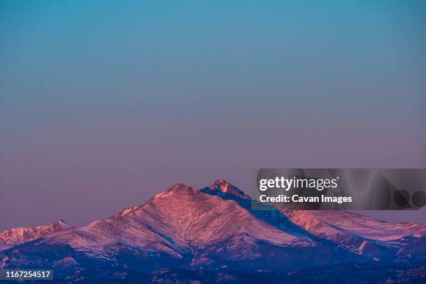 alpine glow over the mt meeker and long's peak - colorado mountains stock pictures, royalty-free photos & images