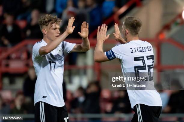 Johannes Eggestein of Germany with Robin Hack of Germany celebrates after scoring his team's fourth goal during the international friendly match...