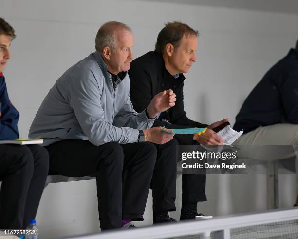 General manager of Dallas Stars Jim Nill and Scott White assistant General Manager and Texas Stars General Manager watch the game between the New...