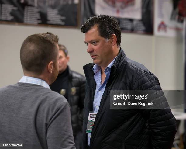 General manager of the Minnesota Wild Bill Guerin does an interview between periods of the Chicago Blackhawks and the Minnesota Wild game during...