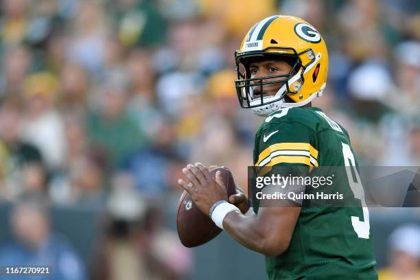 DeShone Kizer of the Green Bay Packers drops back to pass in the first quarter against the Houston Texans during a preseason game at Lambeau Field on...