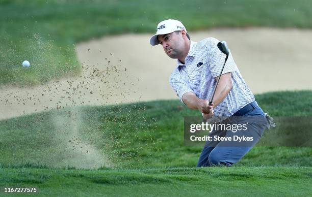 Rob Oppenheim hits out of a bunker on the 16th hole during the third round of the WinCo Foods Portland Open presented by KraftHeinz at Pumpkin Ridge...