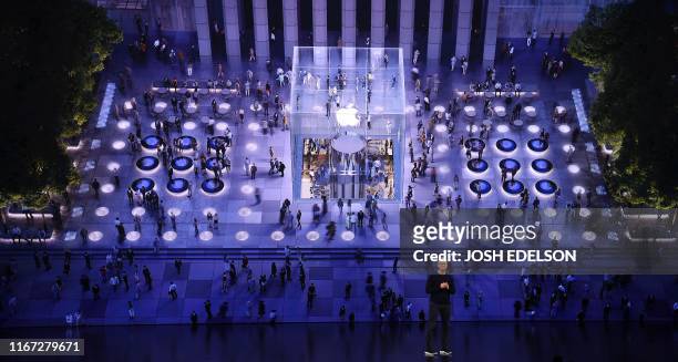 Apple CEO Tim Cook speaks on-stage during a product launch event at Apple's headquarters in Cupertino, California on September 10, 2019. - Apple...