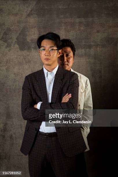 Actors Song Kang Ho and Choi Woo-shik from 'Parasite' are photographed for Los Angeles Times on September 7, 2019 at the Toronto International Film...