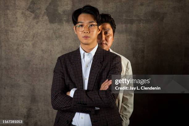 Actors Song Kang Ho and Choi Woo-shik from 'Parasite' are photographed for Los Angeles Times on September 7, 2019 at the Toronto International Film...