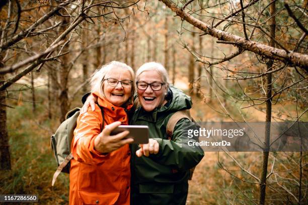 seniors taking a selfie - 70 79 years stock pictures, royalty-free photos & images