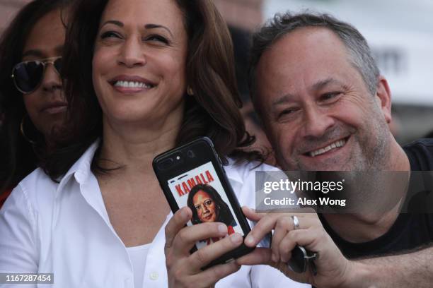 Douglas Emhoff, husband of Democratic presidential candidate U.S. Sen. Kamala Harris , takes a selfie prior to her delivering a campaign speech at...