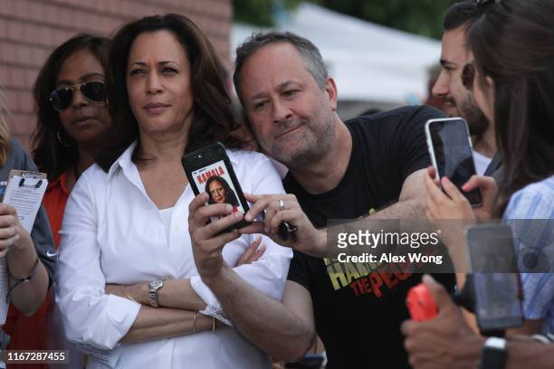 Douglas Emhoff, husband of Democratic presidential candidate U.S. Sen. Kamala Harris , takes a selfie prior to her delivering a campaign speech at...