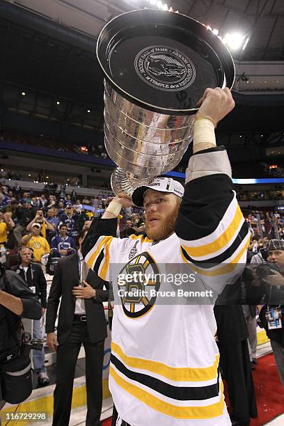 Shawn Thornton of the Boston Bruins celebrates with the Stanley Cup after defeating the Vancouver Canucks in Game Seven of the 2011 NHL Stanley Cup...