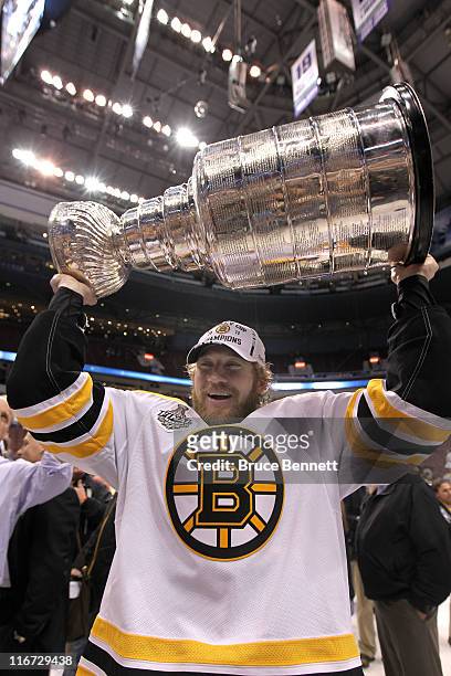 Michael Ryder celebrates with the Stanley Cup after defeating the Vancouver Canucks in Game Seven of the 2011 NHL Stanley Cup Final at Rogers Arena...