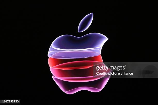 September 2019, US, Cupertino: The Apple company logo on the stage of the Steve Jobs Theater on the company campus. Apple presented three new iPhone...