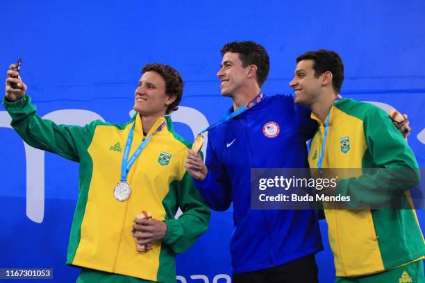 Silver medalist Caio Rodrigues, gold medalist William Licon of United States and Leonardo Coelho of Brazil in the podium of Men's 200m Individual...