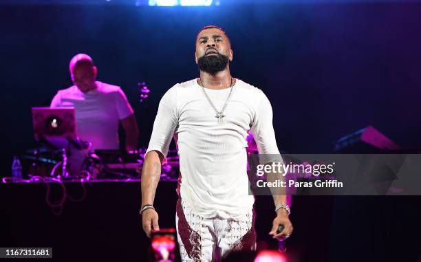 Ginuwine performs onstage during "An Evening Of R&B" concert on August 10, 2019 in Mableton, Georgia.