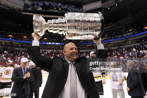 Head coach Claude Julien pose with the Stanley Cup after defeating the Vancouver Canucks in Game Seven of the 2011 NHL Stanley Cup Final at Rogers...