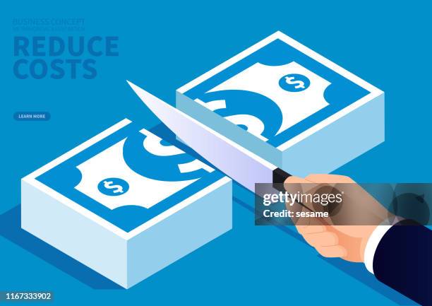 concept of cost reduction, holding a knife in hand and cutting a pile of paper money - separation stock illustrations