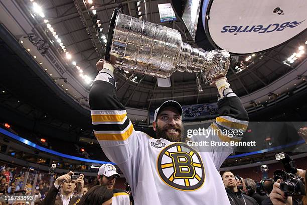 Zdeno Chara of the Boston Bruins celebrates with the Stanley Cup after defeating the Vancouver Canucks in Game Seven of the 2011 NHL Stanley Cup...