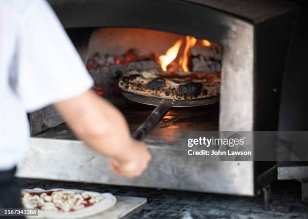 wood-fired pizza oven - pizzeria stock pictures, royalty-free photos & images