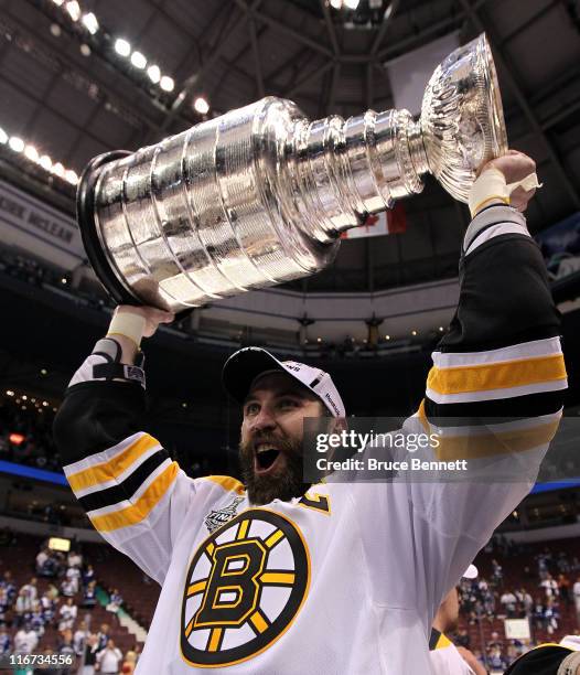 Zdeno Chara of the Boston Bruins celebrates with the Stanley Cup after defeating the Vancouver Canucks in Game Seven of the 2011 NHL Stanley Cup...