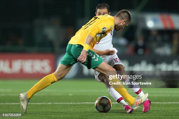 Midfielder Bernardo Silva of Portugal National Team and Forward Domantas Simkus of Lithuania National team during UEFA EURO 2020 Qualifying match...