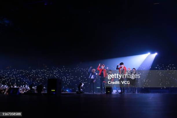 Members of South Korean boy band EXO perform on the stage in concert at AsiaWorld-Expo on August 10, 2019 in Hong Kong, China.