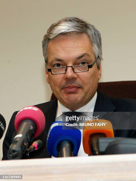 Royal mediator and Finance Minister Didier Reynders speaks during a press conference at the Federal Parliament in Brussels on February 16 after...