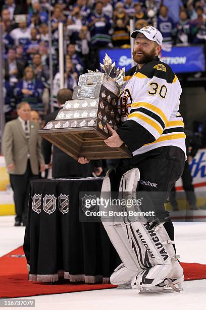 Tim Thomas of the Boston Bruins is awarded the Conn Smythe Trophy after defeating the Vancouver Canucks in Game Seven of the 2011 NHL Stanley Cup...