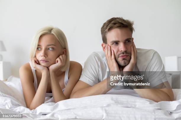 problem in bed - couple relationship difficulties stock pictures, royalty-free photos & images