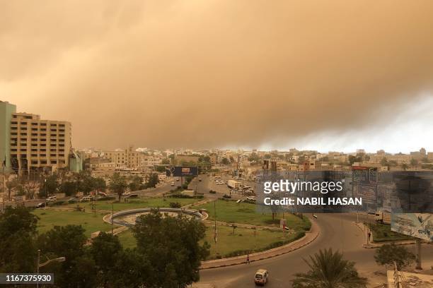 Sand storm approaches Yemen's second city of Aden on September 11, 2019.