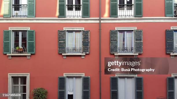 facade of residential building in the fashionable district of brera, milan, italy - brera milan stock pictures, royalty-free photos & images