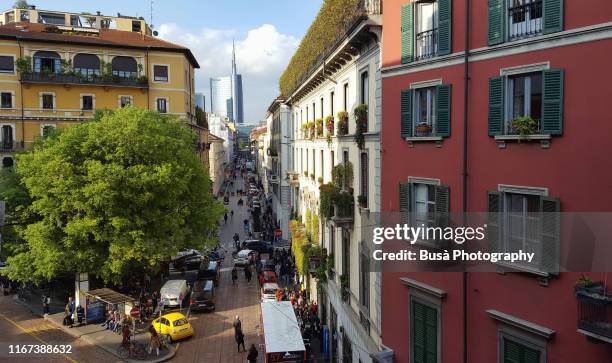 view from above of residential buildings in via solferino, in the fashionable district of brera, milan, italy - milão imagens e fotografias de stock