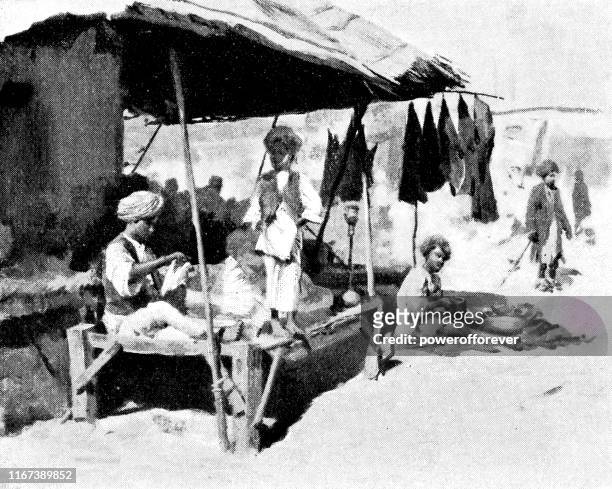 stockillustraties, clipart, cartoons en iconen met stagiairs bij een kleermaker in lahore, pakistan-britse raj tijdperk 19e eeuw - punjab pakistan