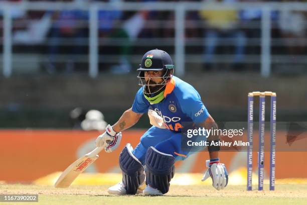 Virat Kohli of India turns for a second run during the second MyTeam11 ODI between the West Indies and India at the Queen's Park Oval on August 11,...