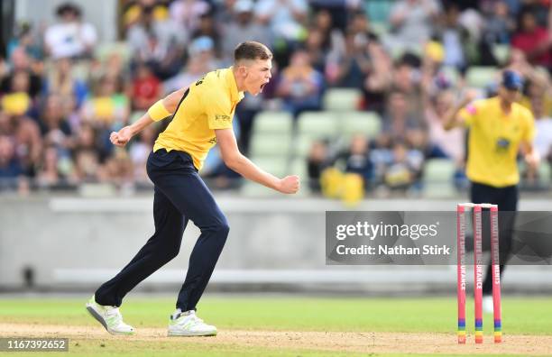 Henry Brookes of Birmingham Bears celebrates as he gets Dane Vilas of Lancashire out during the Vitality Blast match between Birmingham Bears and...