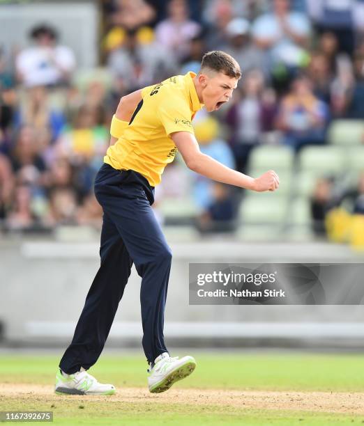 Henry Brookes of Birmingham Bears celebrates as he gets Dane Vilas of Lancashire out during the Vitality Blast match between Birmingham Bears and...