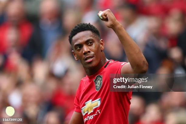 Anthony Martial of Manchester United celebrates after scoring his team's second goal during the Premier League match between Manchester United and...