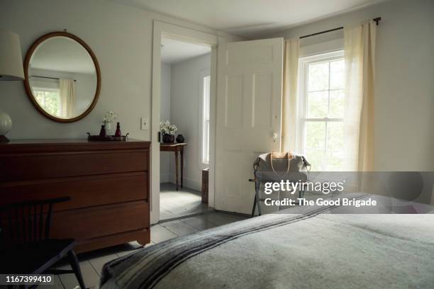 interior shot of bedroom in country home - bureau fotografías e imágenes de stock