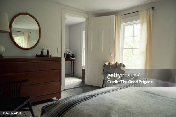 interior shot of bedroom in country home - bureau stock pictures, royalty-free photos & images