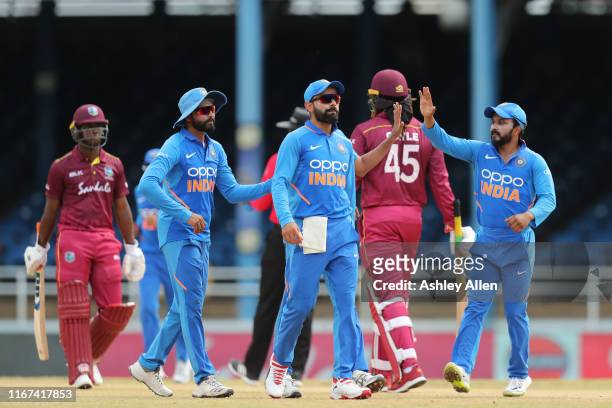 India pick up the wicket of Chris Gayle LBW to Bhuvneshwar Kumar for 11 during the second MyTeam11 ODI between the West Indies and India at the...