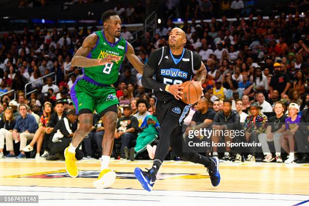 Power guard Corey Maggette drives past 3 Headed Monsters center Larry Sanders during the BIG3 third place game between the Power and the 3 Headed...