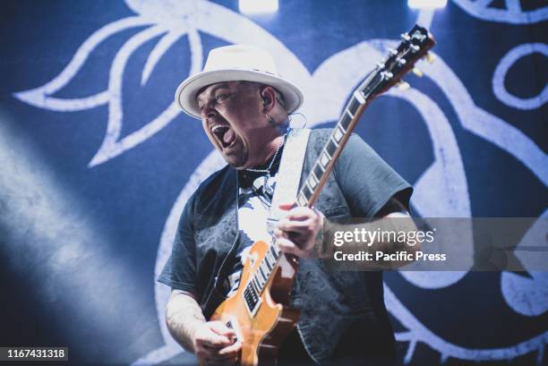 Chris Robertson, singer and guitarist of the American band Black Stone Cherry, performs live at the Pala Alpitour in Torino, opening for Alice Cooper.
