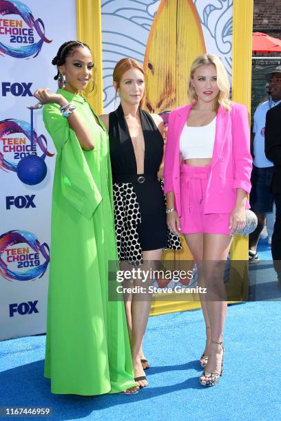 Megalyn Echikunwoke, Brittany Snow, and Emily Osment attend FOX's Teen Choice Awards 2019 on August 11, 2019 in Hermosa Beach, California.