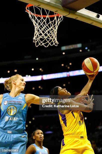 Guard Tierra Ruffin-Pratt of the Los Angeles Sparks goes up for a shot as guard Allie Quigley of the Chicago Sky attempts to block during the second...